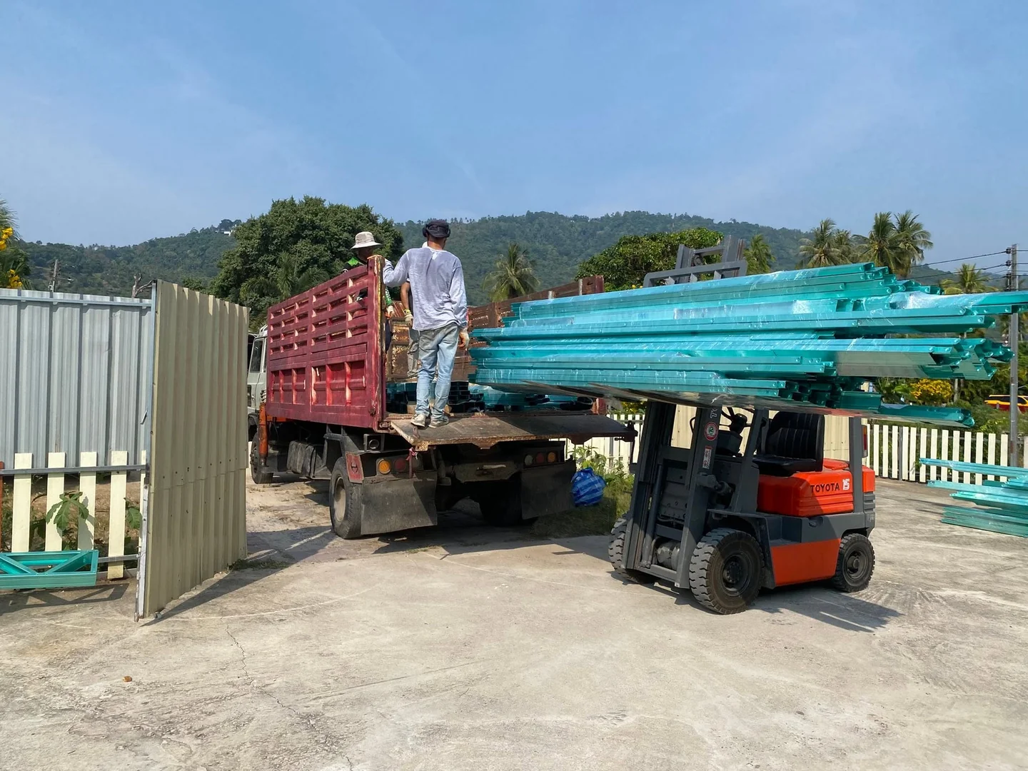 Regular steel structure deliveries to a construction site in Chong Mon