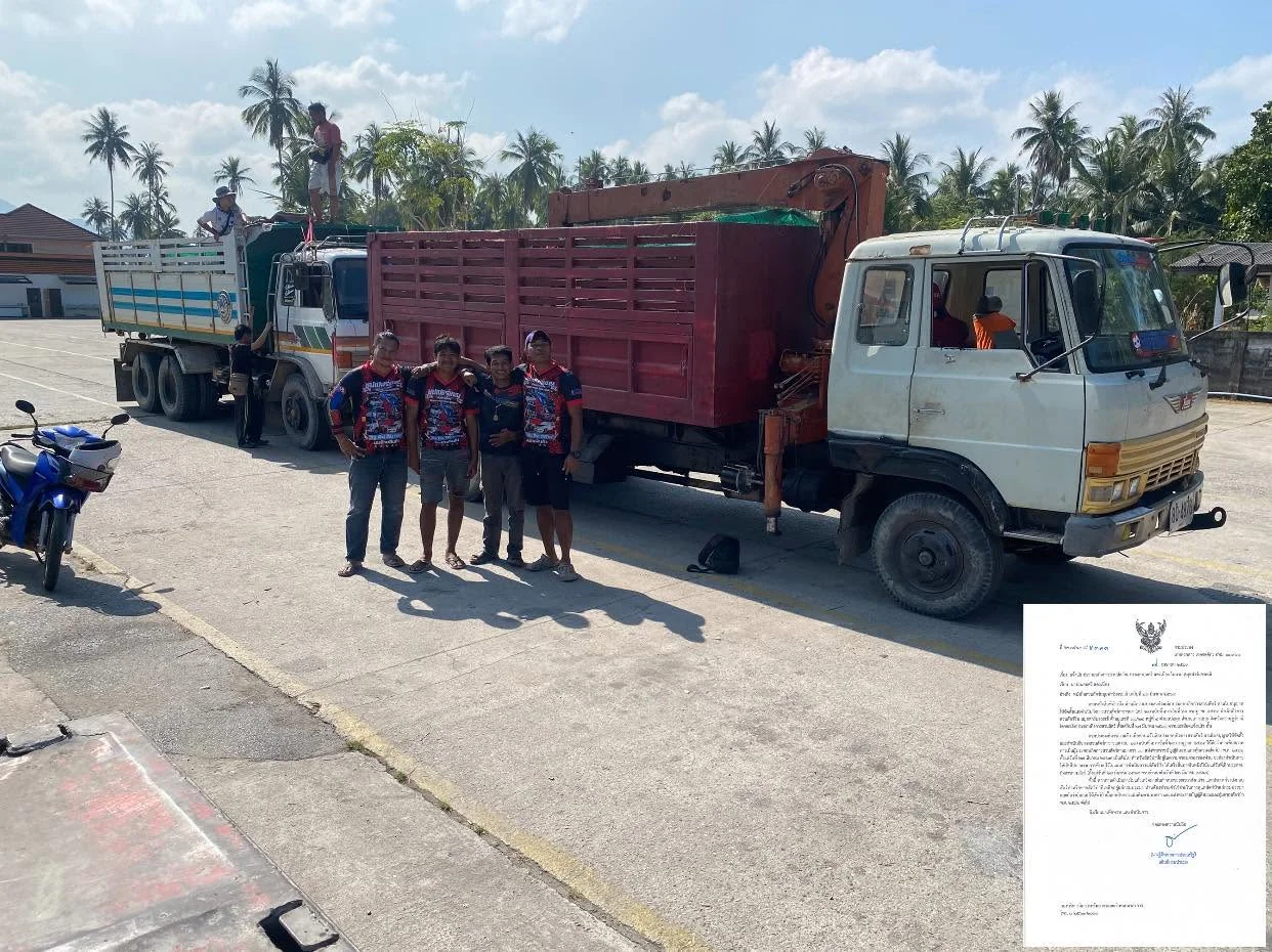 Our team posing with the unusual cargo before departure