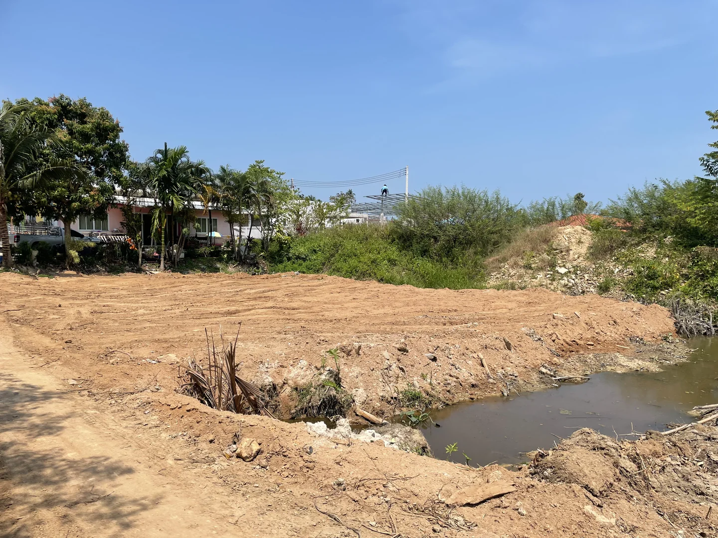 Same area after drainage work, backfill and leveling