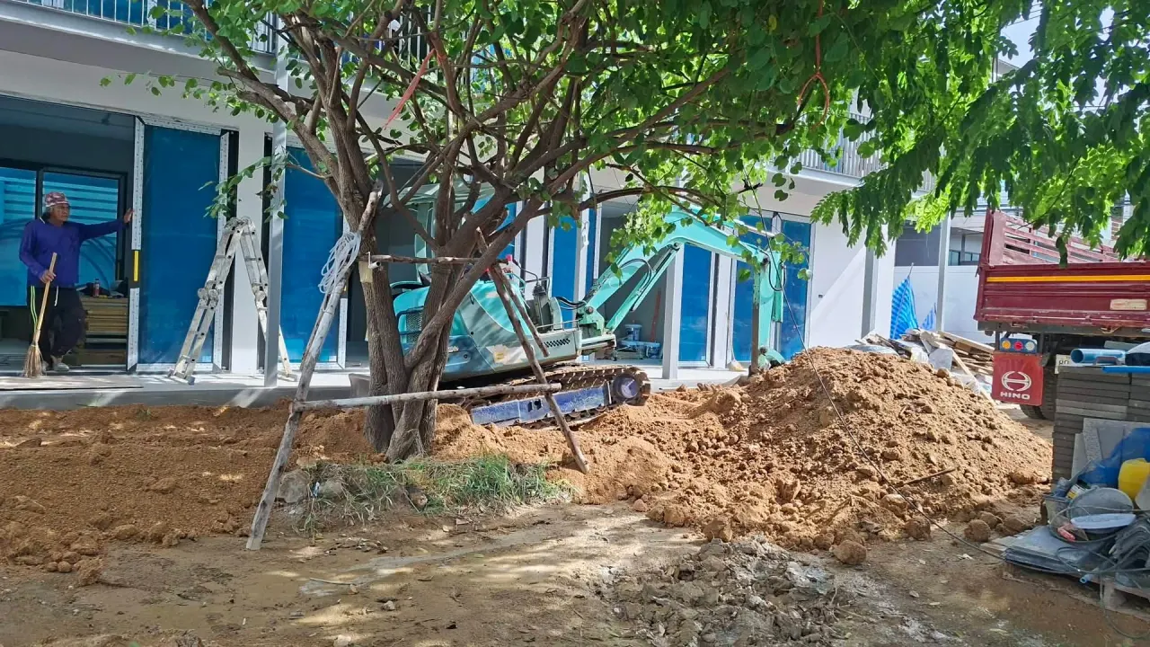 Final grading of the ground across the site