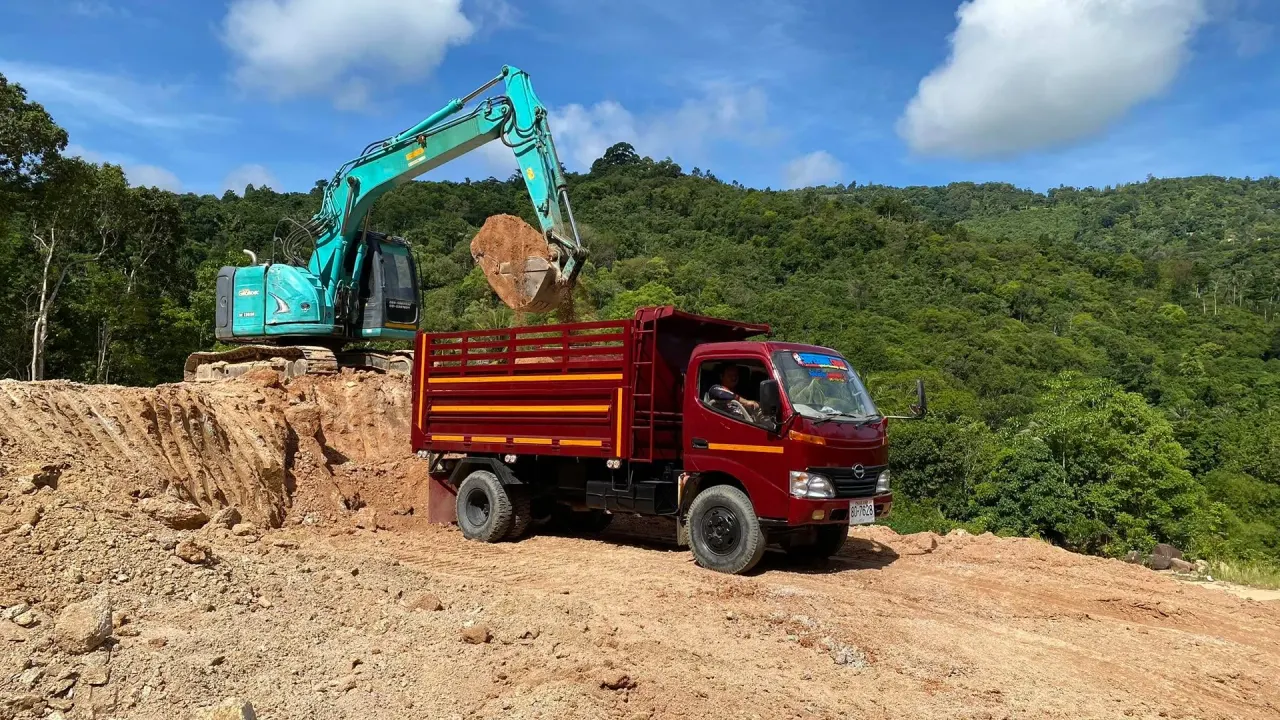 Loading fill onto our dump truck for delivery to the site