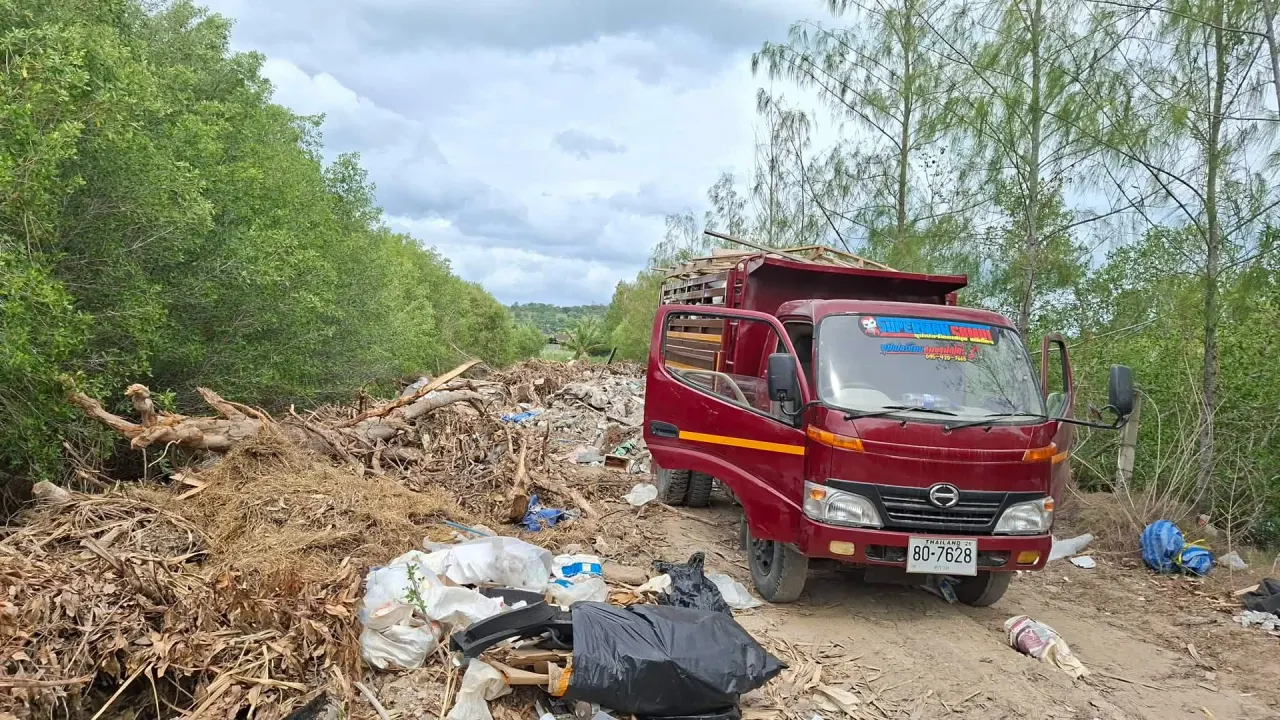 Tipping the waste from the dump truck at the landfill