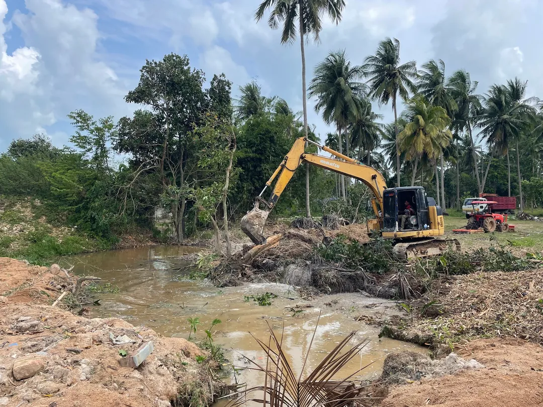 Drainage channel for moving water away from land