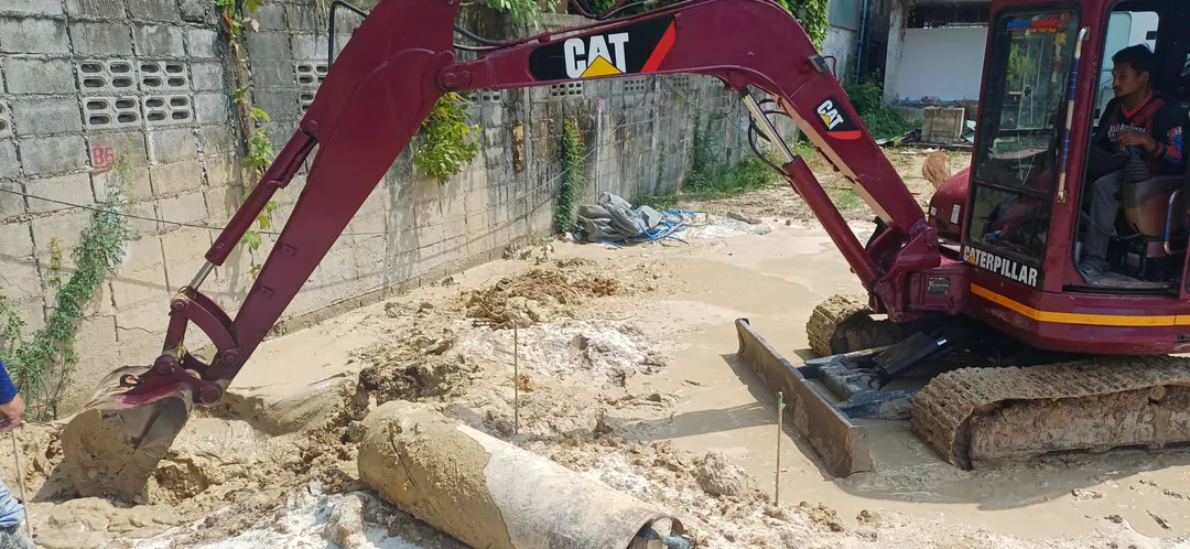 Preparing wet land with drainage before further earthworks