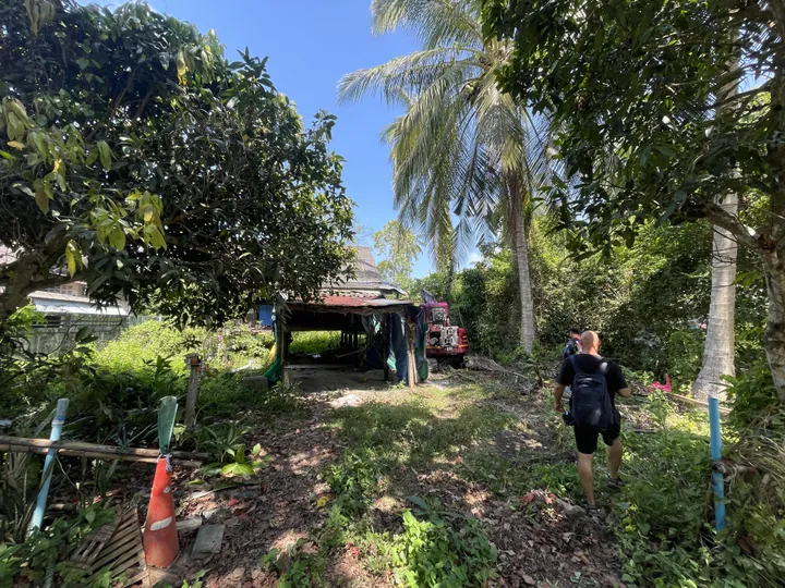 Old house and overgrown land before demolition in Lipanoi Koh Samui