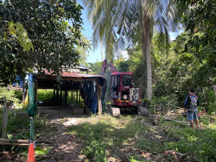 Demolition of old structures and metal elements during land clearing on Koh Samui