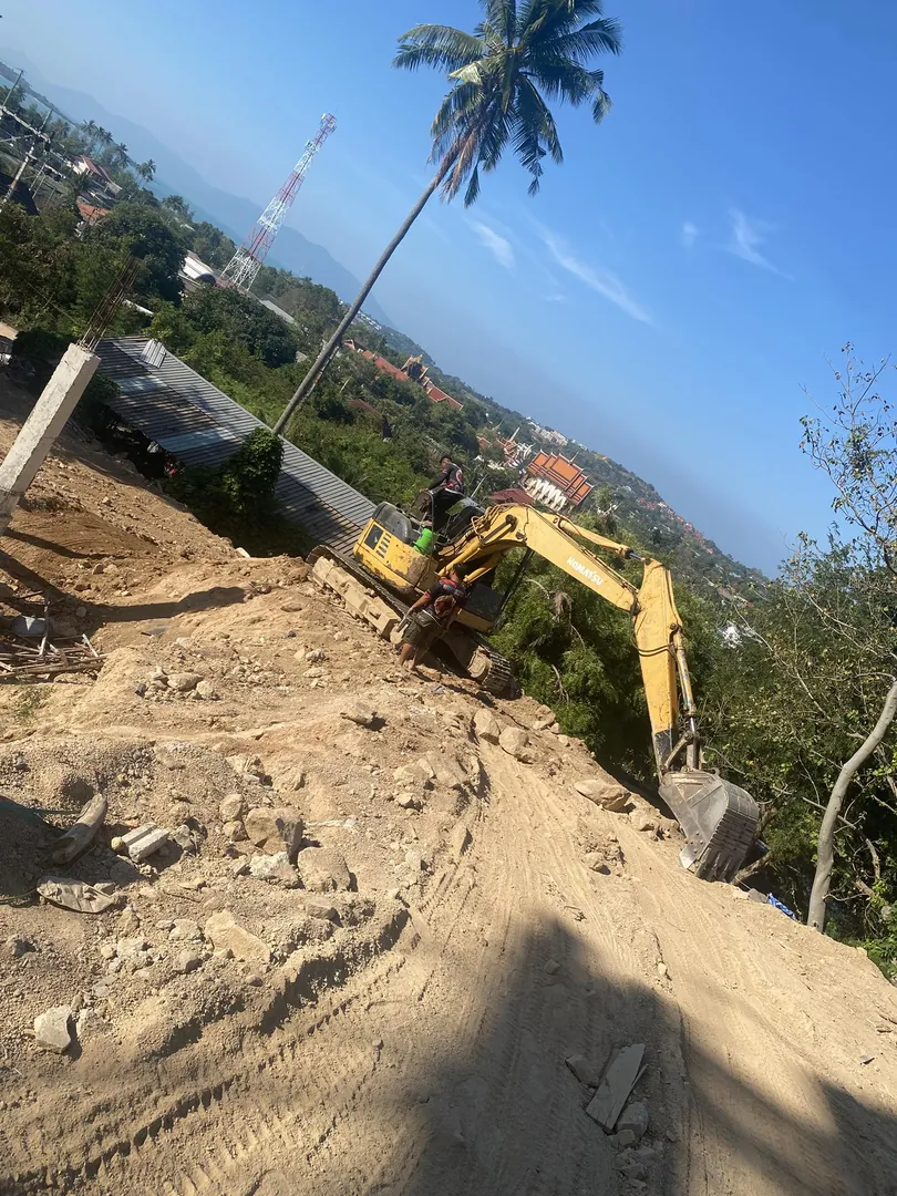 Preparing access road for construction machinery