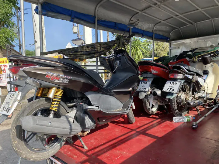 Transporting a scooter by truck with careful loading and delivery